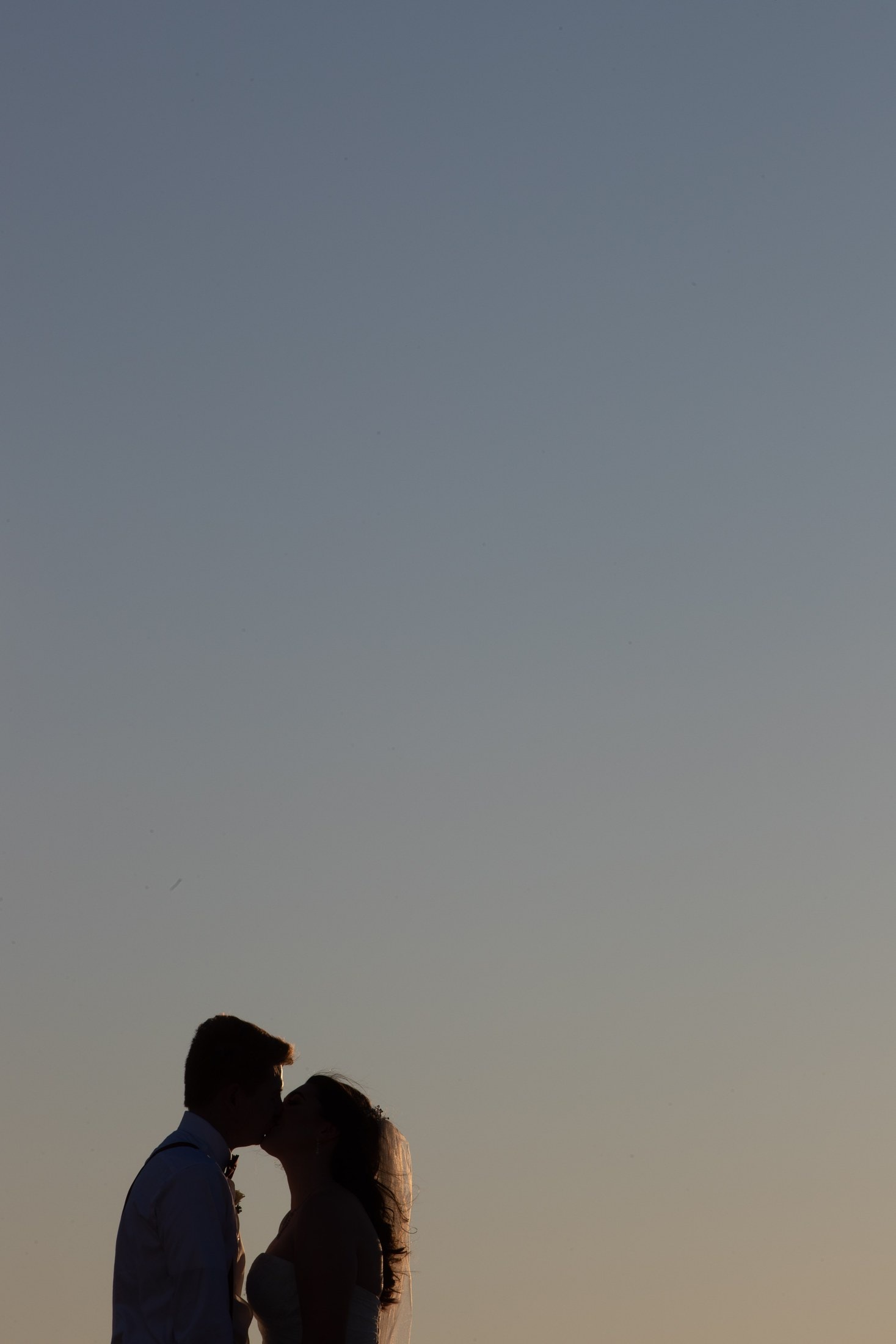 Couple silhouetted at dusk