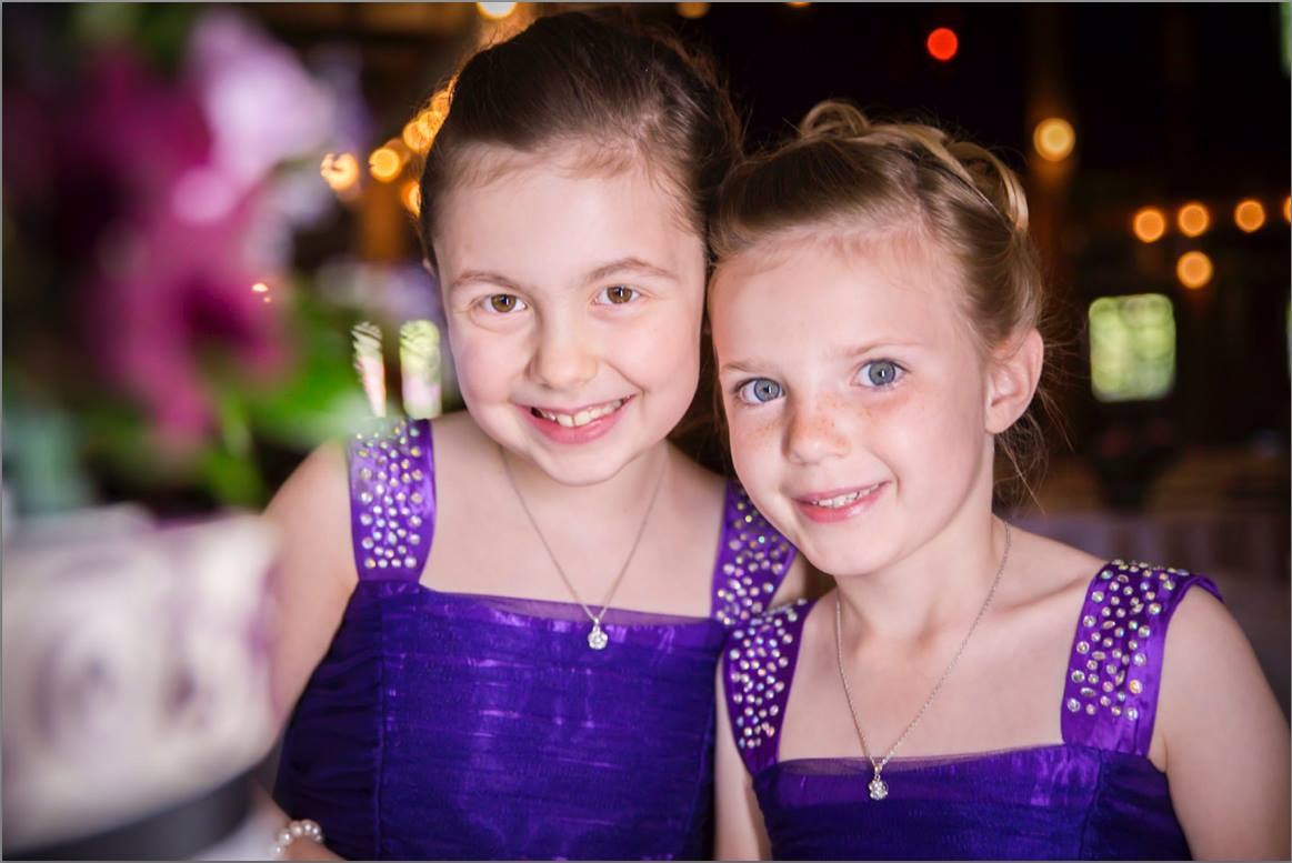 Two flower girls at the reception